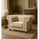 Sillón Chesterfield con capitoné real tapizado en tela